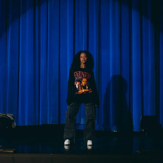 Full-length view of the black Eminem Encore 20th Anniversary long sleeve on stage