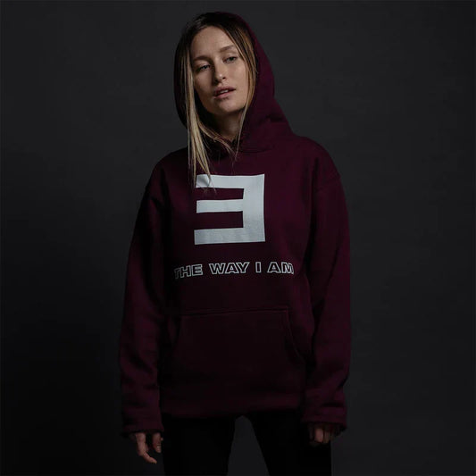 Woman wearing the maroon Eminem The Way I Am hoodie with grey E logo chest print