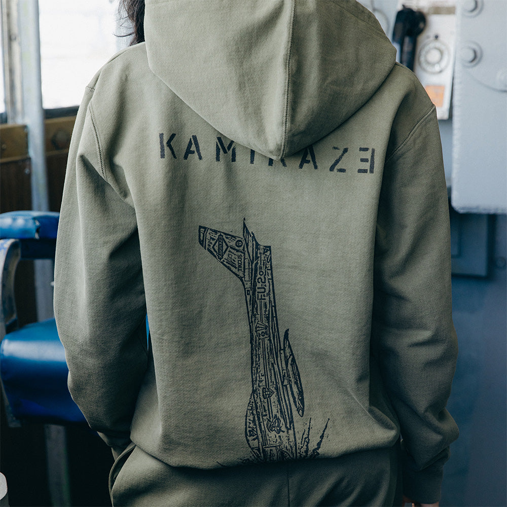 Back of the burnt olive Eminem Kamikaze hoodie with hood-line Kamikaze lettering