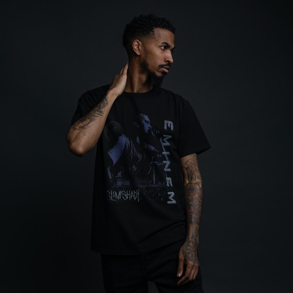 Man wearing the black Eminem Throwback To '99 vintage style T-shirt