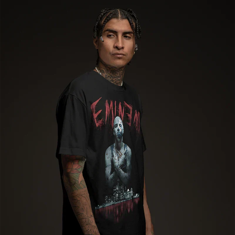 Man wearing the black Eminem Bloody Horror T-shirt with red drip logo and greyscale portrait print