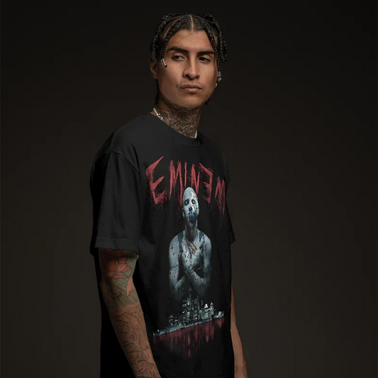 Man wearing the black Eminem Bloody Horror T-shirt with red drip logo and greyscale portrait print