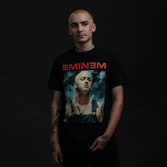 Man wearing the black Eminem Bloody Chainsaw T-shirt with red logo and Slim Shady portrait