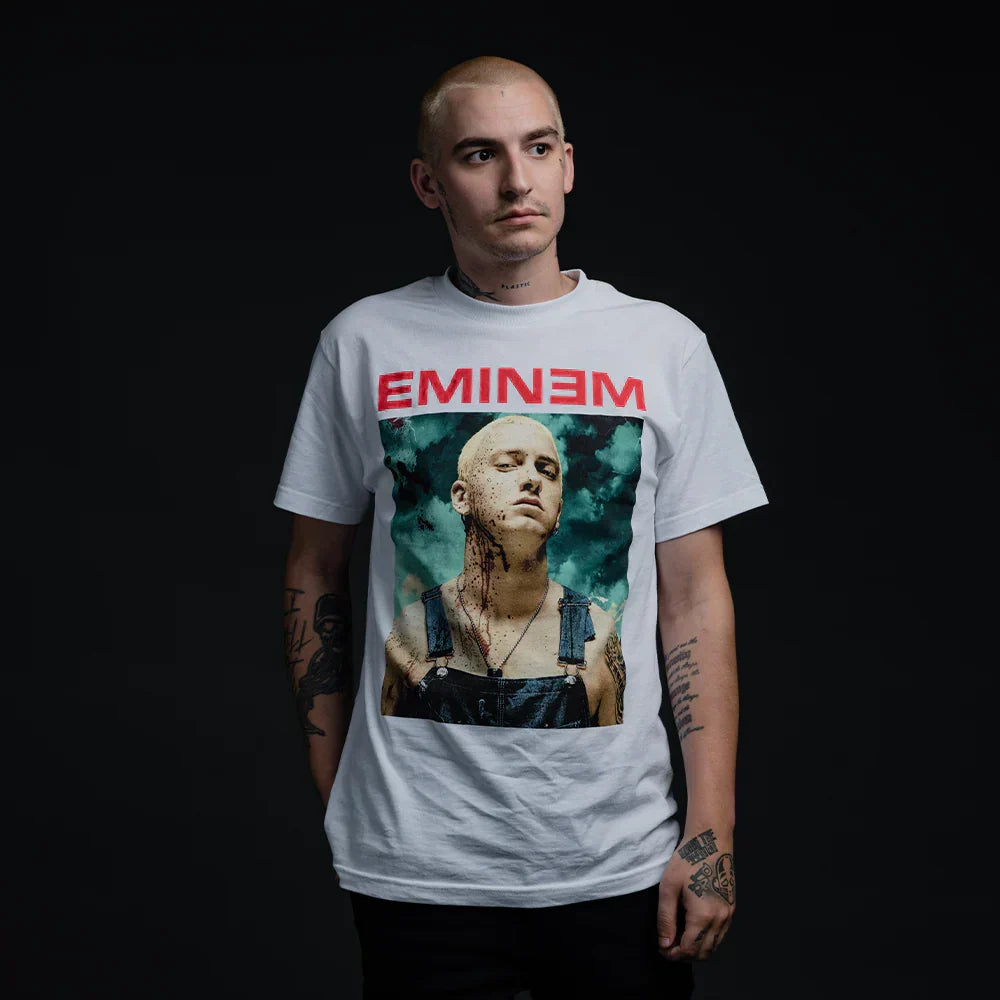 Man wearing the white Eminem Bloody Chainsaw T-shirt with red logo and Slim Shady portrait