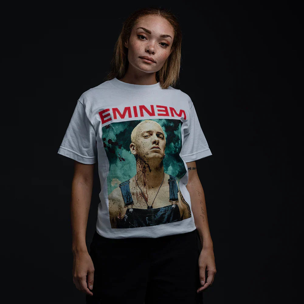 Woman wearing the white Eminem Bloody Chainsaw T-shirt, red Eminem logo over the portrait print