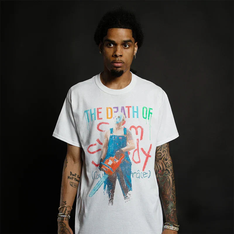 Man wearing the white Eminem TDOSS Chainsaw T-shirt with chainsaw figure graphic
