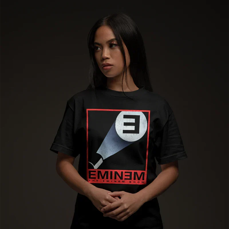 Woman wearing the black Eminem E Spotlight distressed logo T-shirt with red frame print