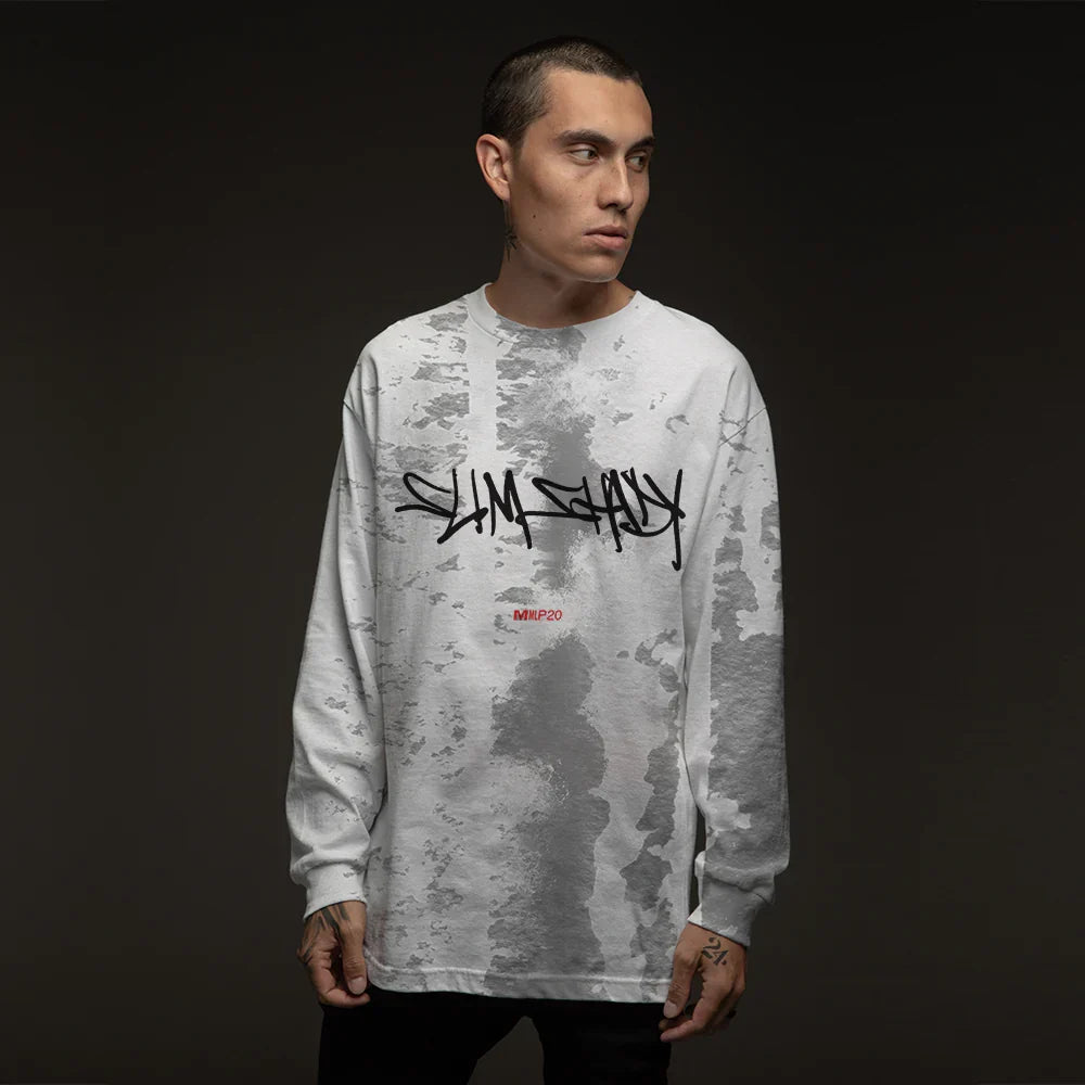 Man wearing the white tie-dye Eminem Slim Shady long sleeve with black script print