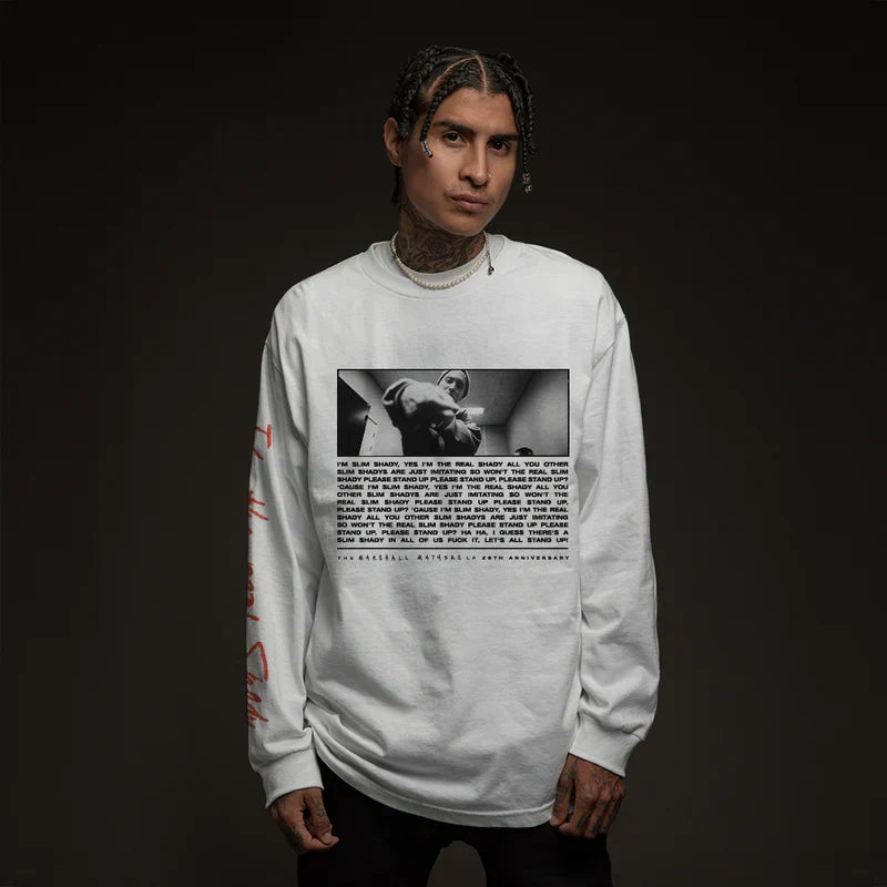 Man wearing the white Eminem I'm The Real Slim Shady sweatshirt with photo and text print