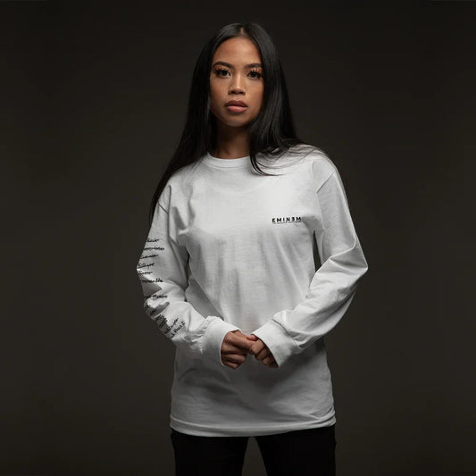 Woman wearing the white Eminem MMLP Loose Leaf long sleeve shirt, front view