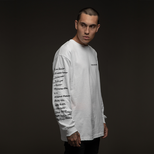 Man wearing the white Eminem MMLP Loose Leaf long sleeve with handwritten sleeve print