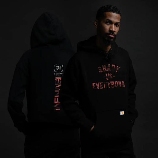 Two views of the black Marshall Mathers Foundation x Detroit Vs Everybody Eminem hoodie