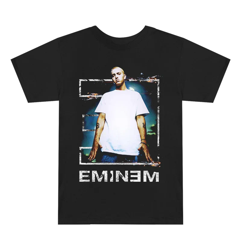 Black Eminem Tower T-shirt flat lay, framed rooftop photo above the white Eminem logo