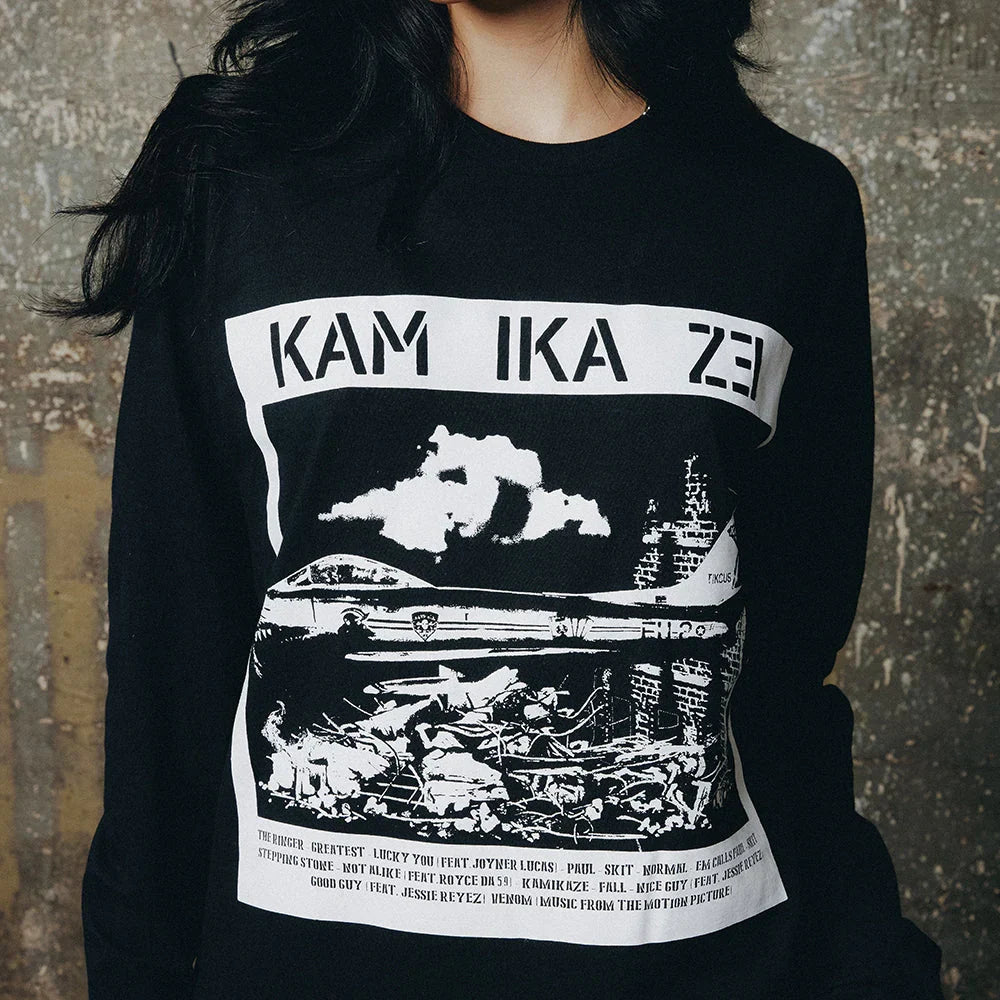 Detail of the black Eminem Kamikaze Rubble long sleeve print with bomber and debris art