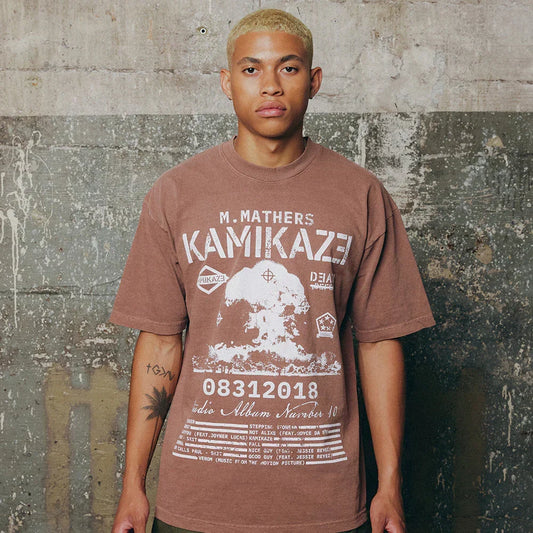Man in the rust red Eminem Kamikaze vintage album art T-shirt with mushroom cloud print