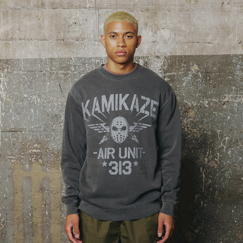 Man in grey Eminem Kamikaze Air Unit 313 crewneck sweatshirt with hockey mask and wings graphic