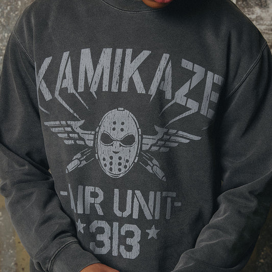 Chest print close-up of the Eminem Kamikaze Air Unit 313 crewneck, hockey mask and lightning bolts