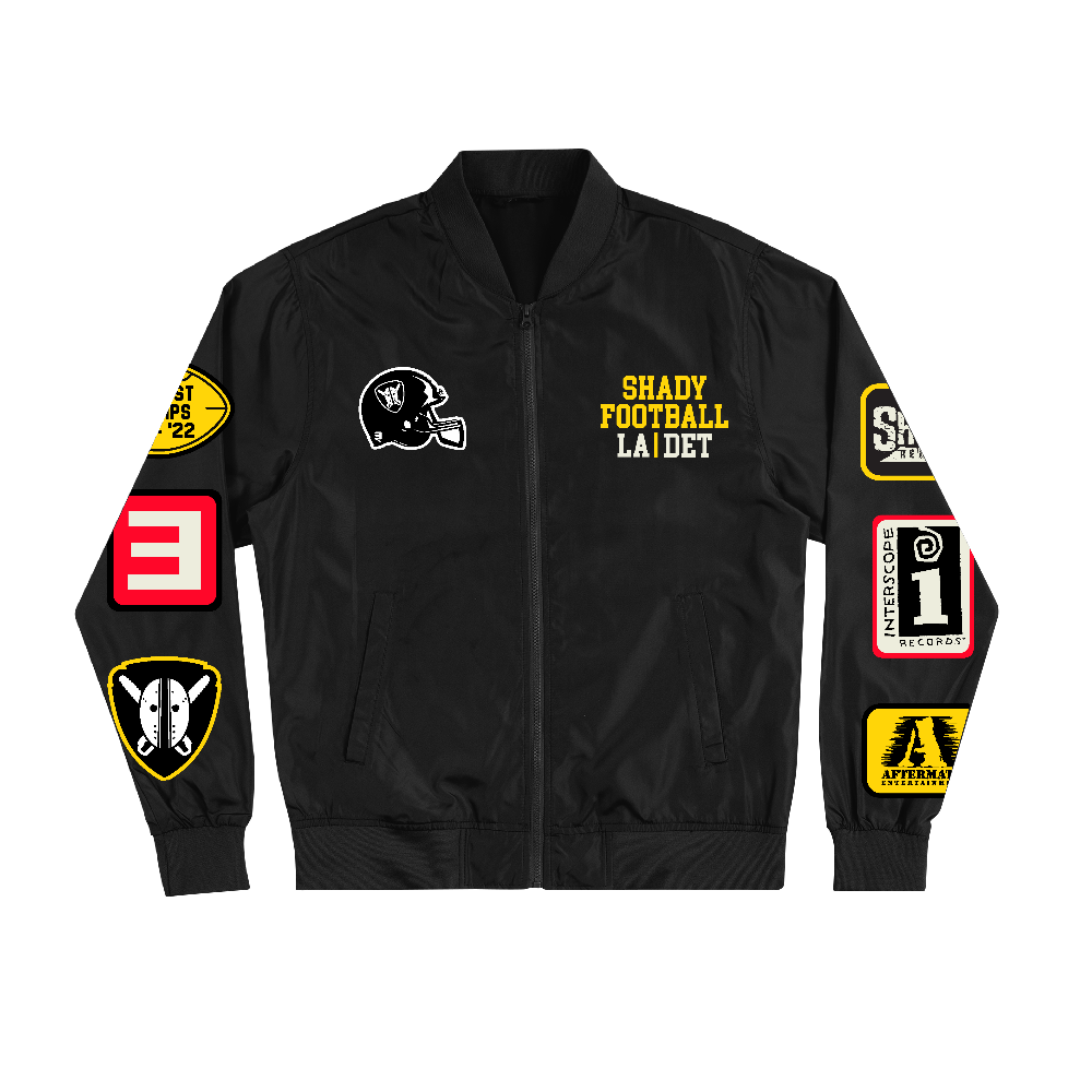 Front of the black Eminem Shady Football bomber jacket with helmet logo and sleeve patches