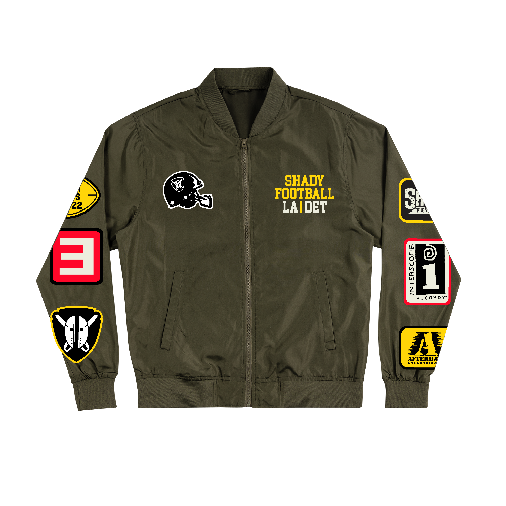 Front of the olive Eminem Shady Football bomber jacket with helmet and album patches