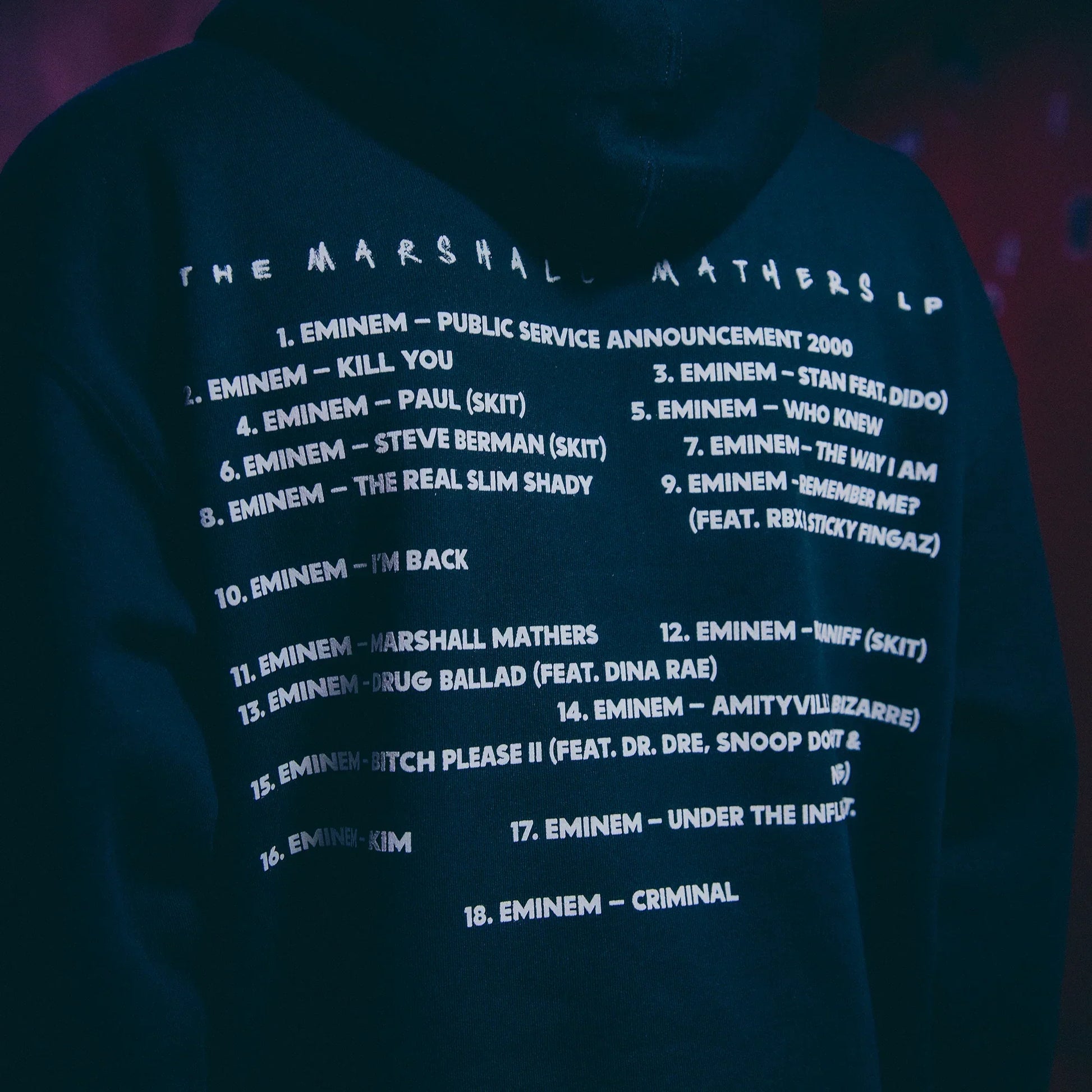 Back print of the Eminem MMLP25 hoodie listing The Marshall Mathers LP track names