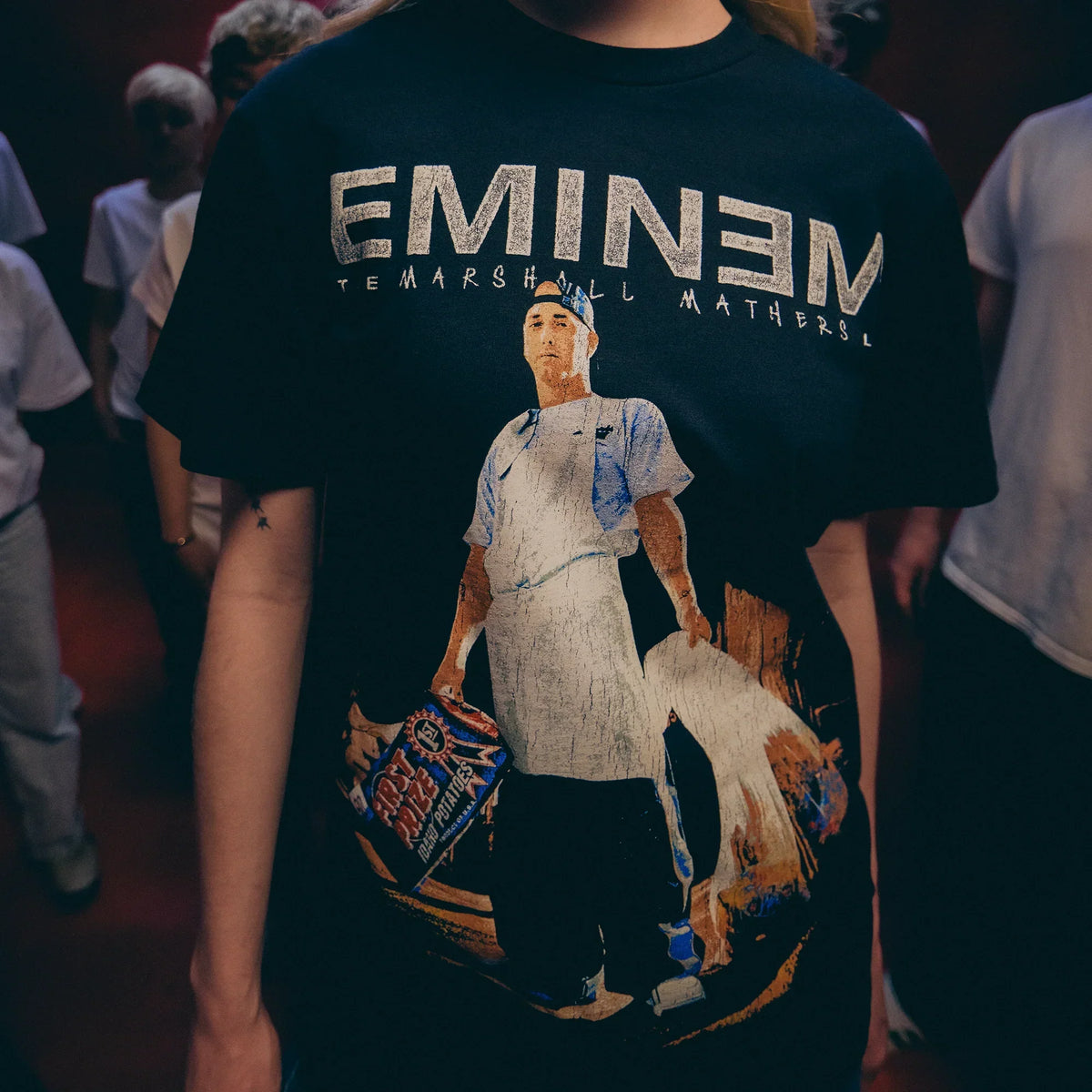 Close-up of the Eminem MMLP25 Tracklist T-shirt front print with seated portrait
