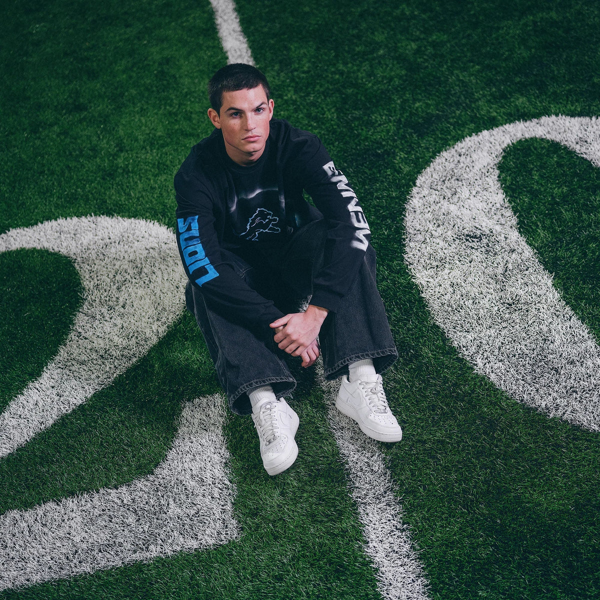 Eminem x Detroit Lions Silhouette long sleeve worn on the field, sleeve print visible