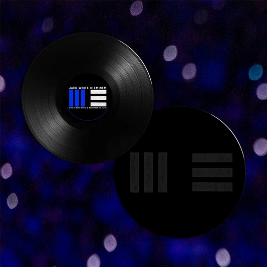 Eminem x Jack White Live at Ford Field vinyl records on a blue stage-lit backdrop