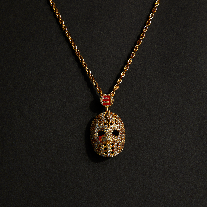 Eminem hockey mask diamond pendant in gold on a gold rope chain
