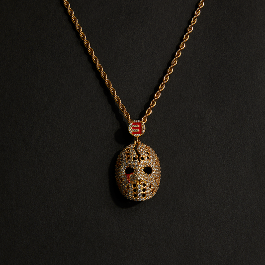 Eminem hockey mask diamond pendant in gold on a gold rope chain