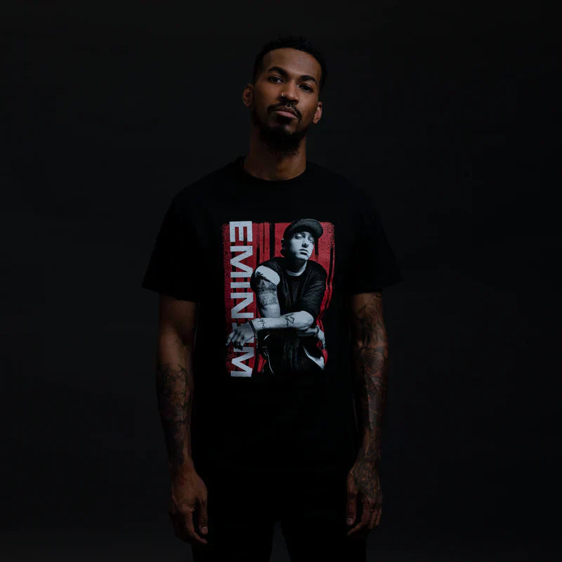 Man wearing the black Eminem Graphic Lean T-shirt with red and white photo print