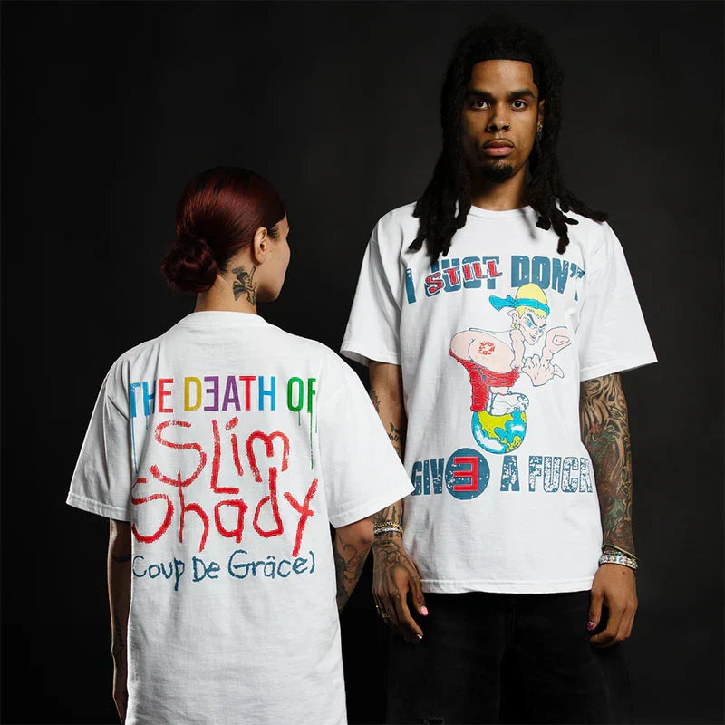 Two models in white Eminem TDOSS ISDGAF T-shirts with colourful graffiti prints