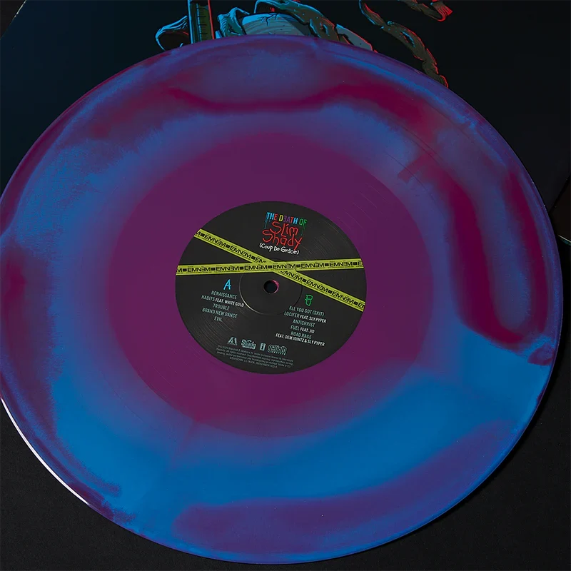 Close-up of the Eminem Shady LPs coloured vinyl with blue and pink swirl pattern