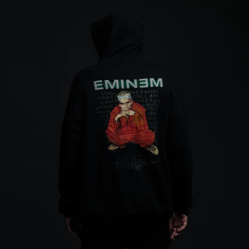 Back of the black Eminem Orange Jumpsuit hoodie with seated prison portrait print
