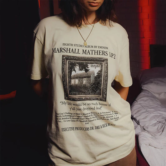 Close-up of the Marshall Mathers LP2 album art print on the cream Eminem T-shirt