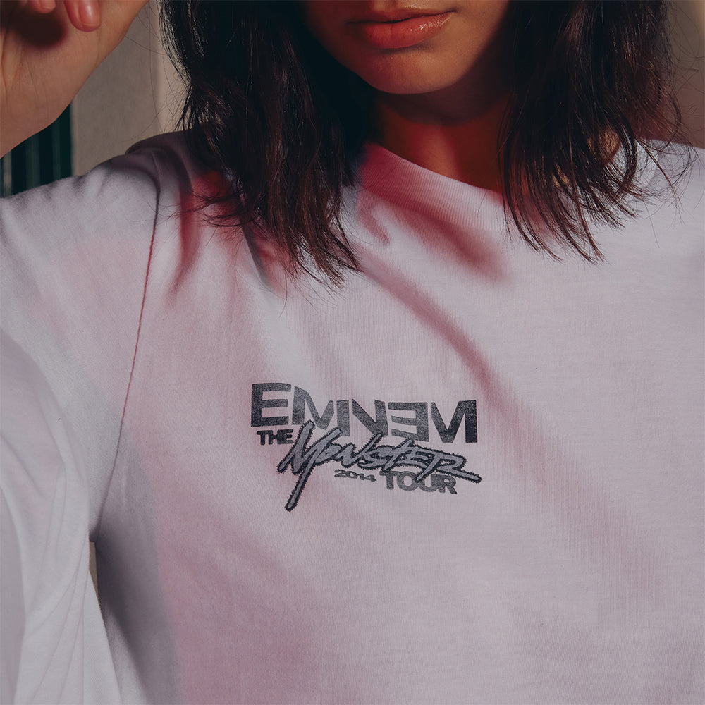 Close-up of the Eminem Monster Tour chest print on the white MMLP2 T-shirt