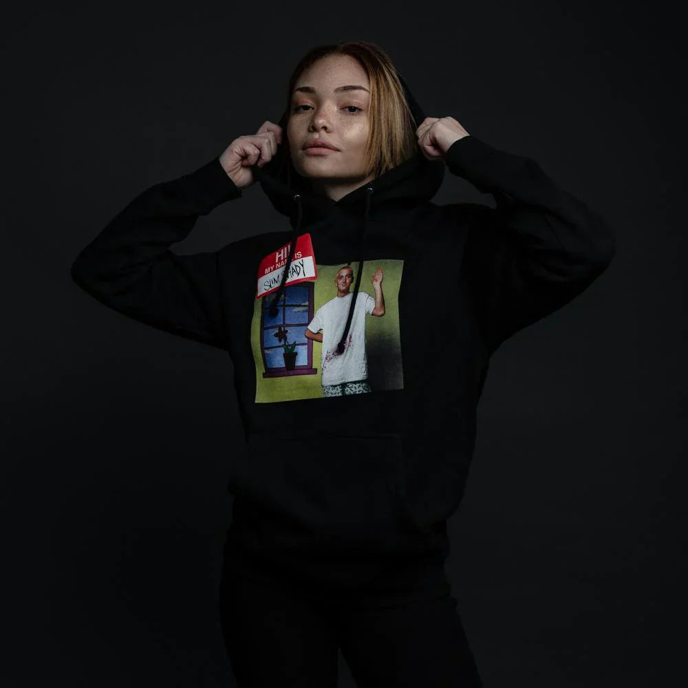 Woman wearing the black Eminem My Name Is hoodie, hood up, with photo chest print