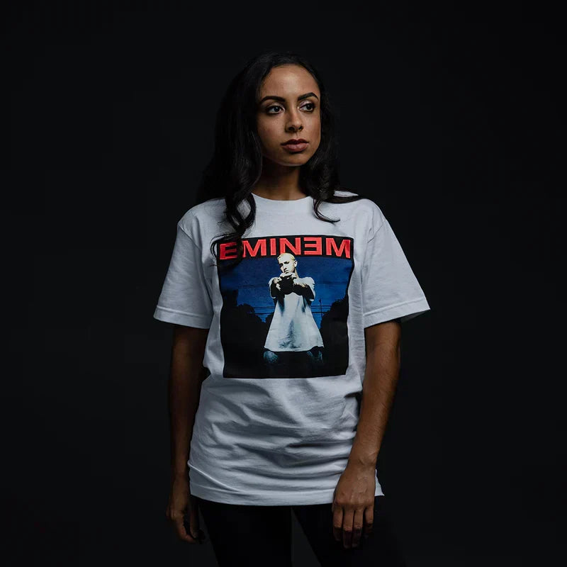 Woman wearing the white Eminem Powerline photo T-shirt, blue-toned portrait panel print