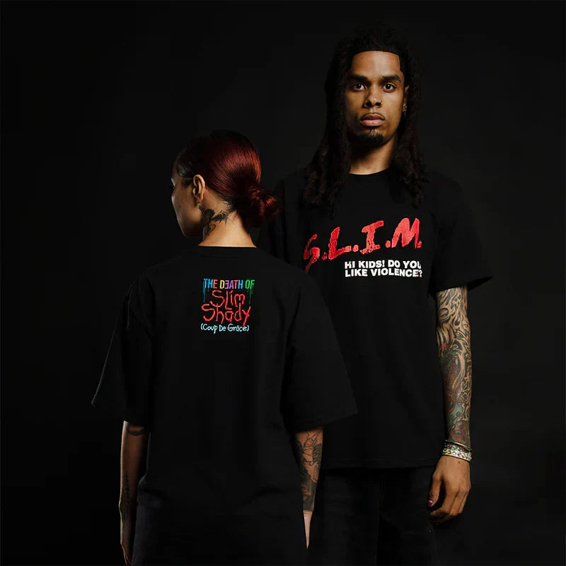 Two models in black Eminem S.L.I.M T-shirts with red chest lettering