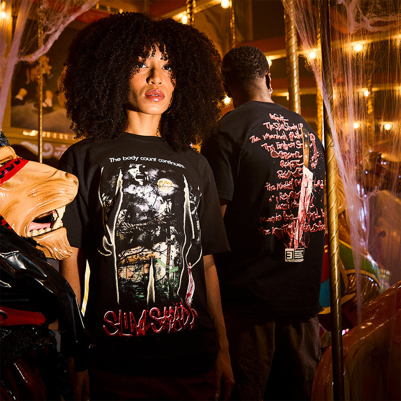 Two models in black Eminem Body Count T-shirts at a fairground, front and back Slim Shady prints