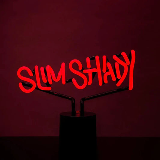 Eminem Slim Shady neon sign lit red against a dark wall