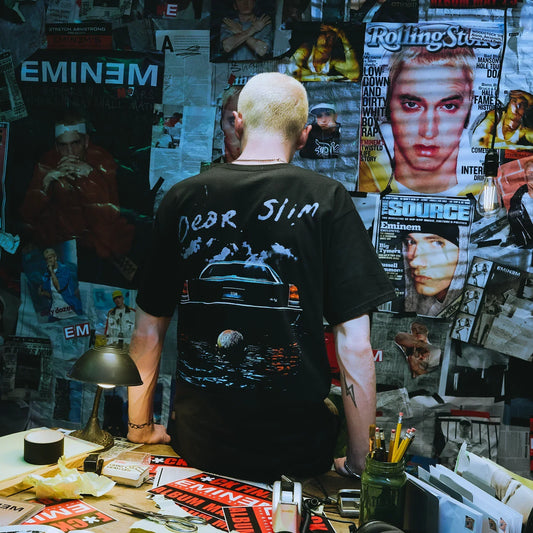 Back of the black Eminem Dear Slim T-shirt worn by a model, sinking car and script print