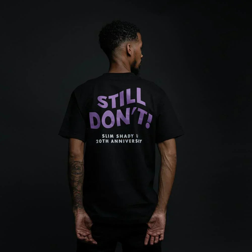 Back of the black Eminem Still Don't T-shirt with purple Slim Shady LP anniversary print