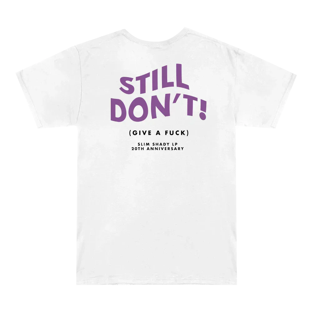 Back of the white Eminem Still Don't T-shirt flat with purple Still Don't lettering