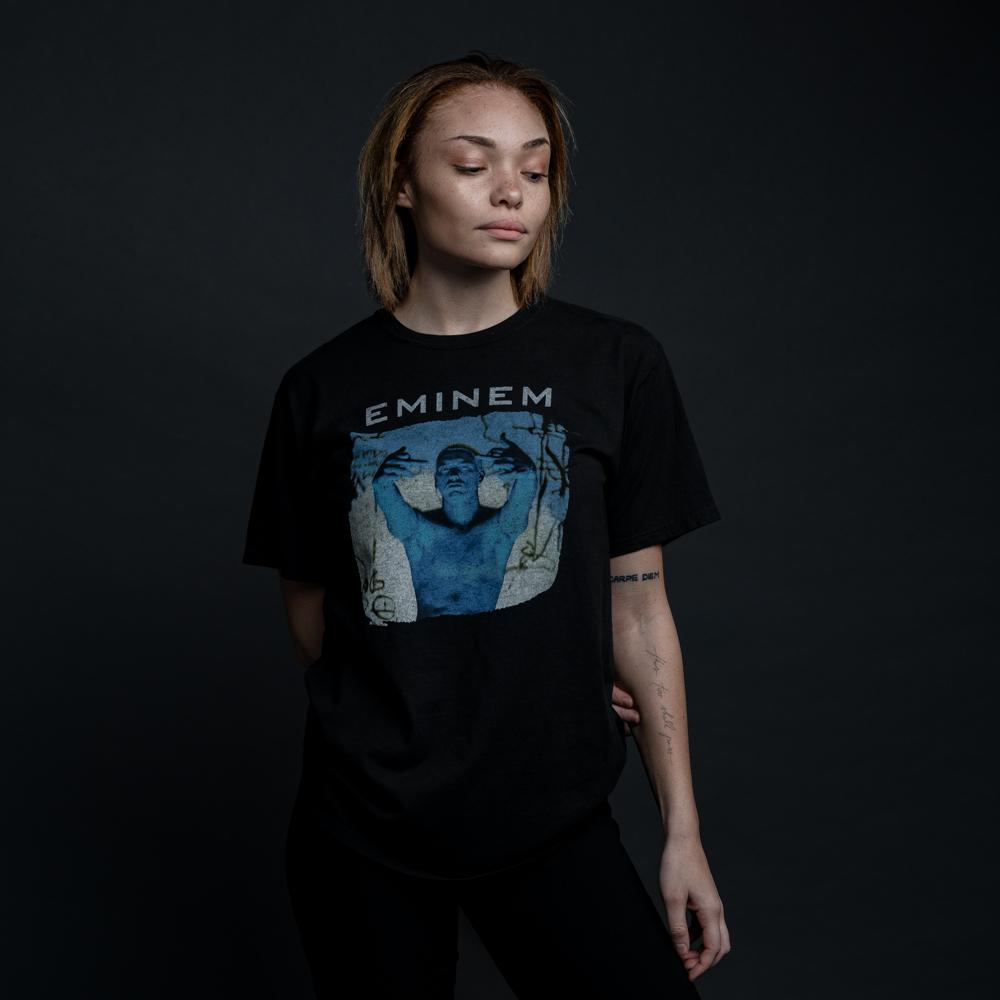 Woman wearing the black Eminem Slim Shady LP Tour reissue T-shirt with photo print