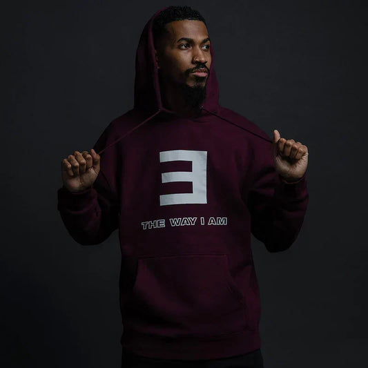 Man wearing the maroon Eminem The Way I Am hoodie with large grey E logo print