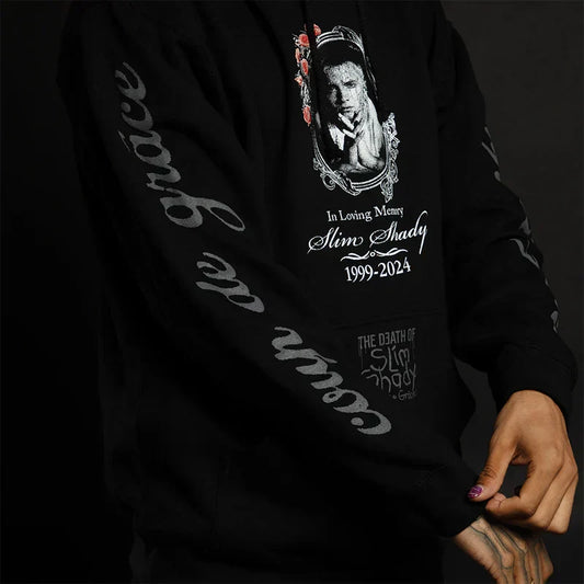 Sleeve detail reading Coup De Grace on the black Eminem TDOSS memorial hoodie