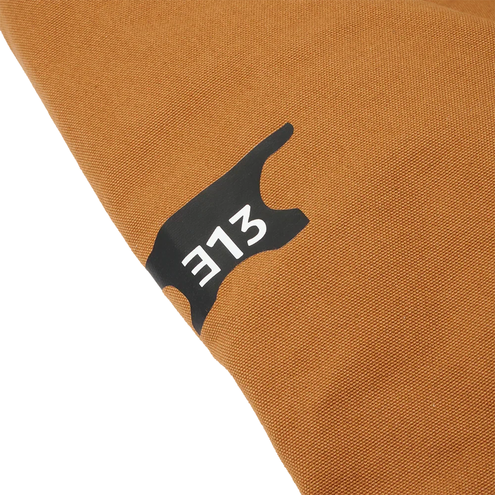 Sleeve detail of the Eminem 8 Mile Carhartt jacket showing the black 313 Detroit area-code tab