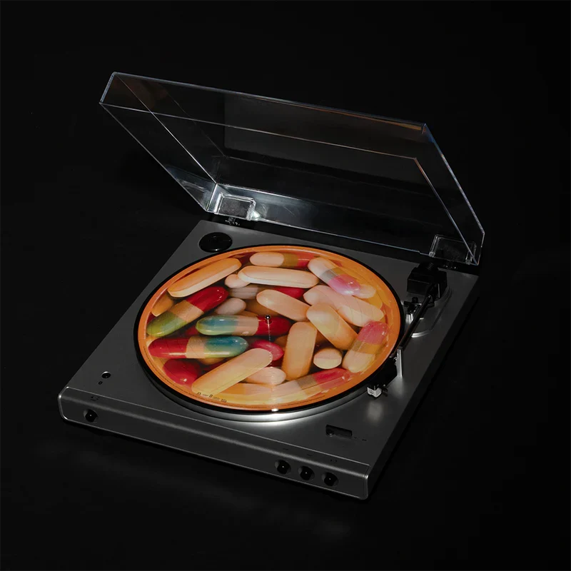 Eminem My Mom picture disc on an open turntable, artwork of scattered orange and red prescription pills