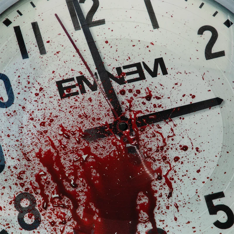Macro detail of Eminem 3 AM picture disc artwork showing blood splatter across the clock numerals