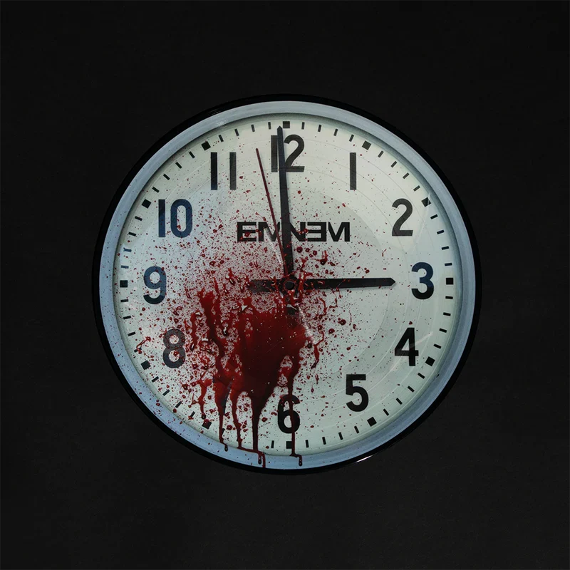 Eminem 3 AM picture disc close-up, pale blue clock face with red blood splatter and black Eminem logo